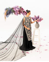 Black Velvet Masterpiece with Floral Embellishments & Dramatic Cape