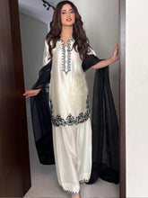 Graceful White & Black Embroidered Ensemble